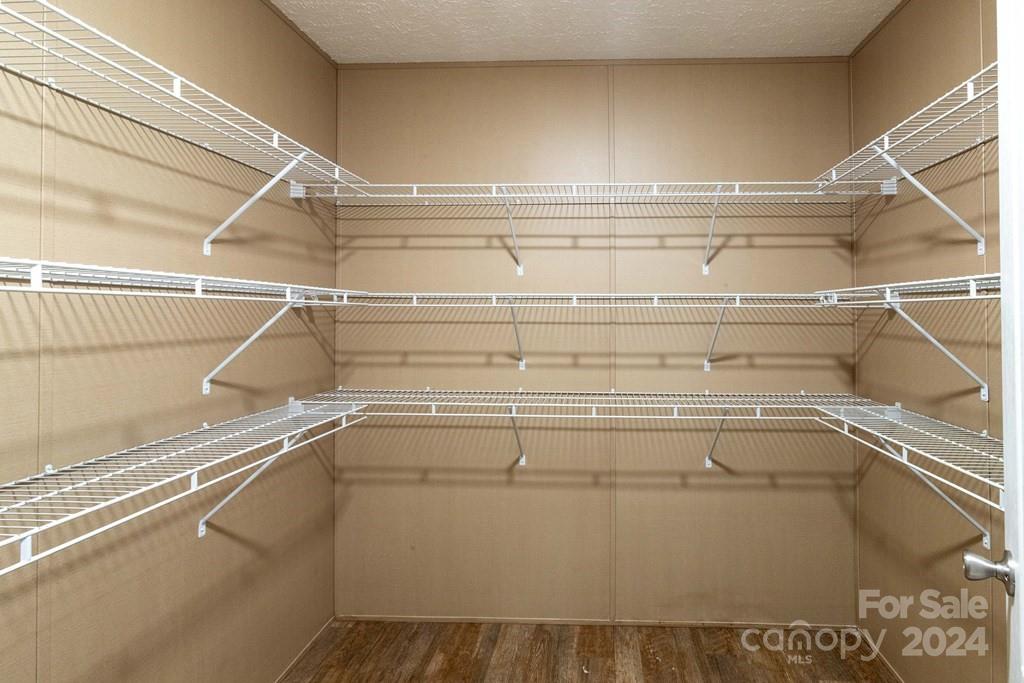 572 Dark Ridge Road Sylva, NC 28779 - Photo 18 of 26 a view of a room with racks on the wall