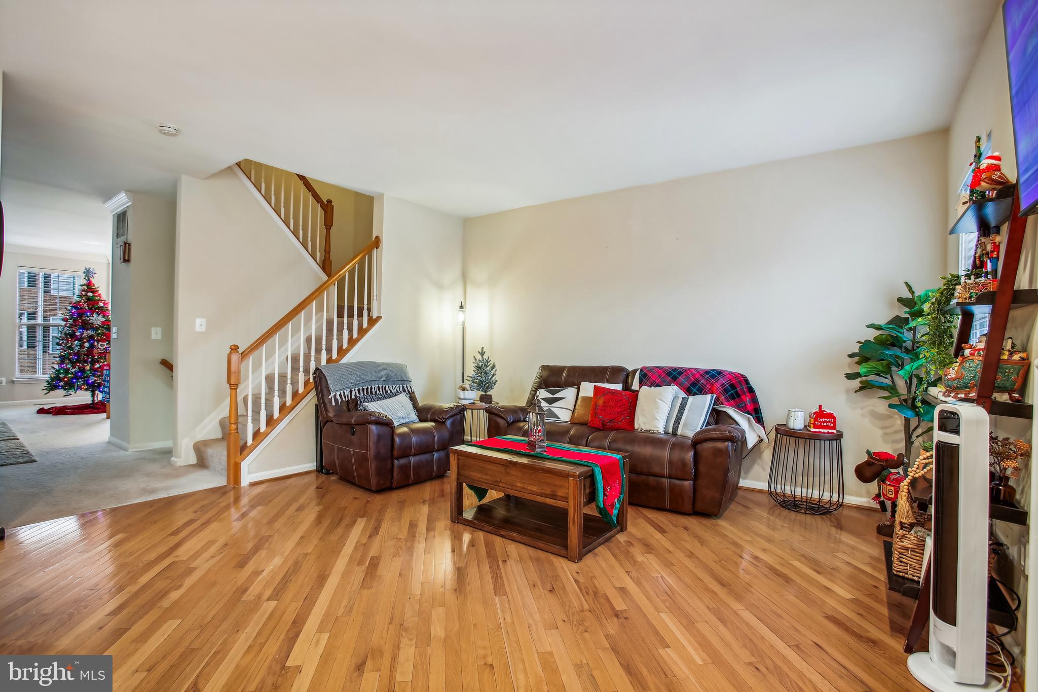 6624 Springirth Terrace Alexandria, VA 22315 - Photo 14 of 37 Family room (stairs to upper level)