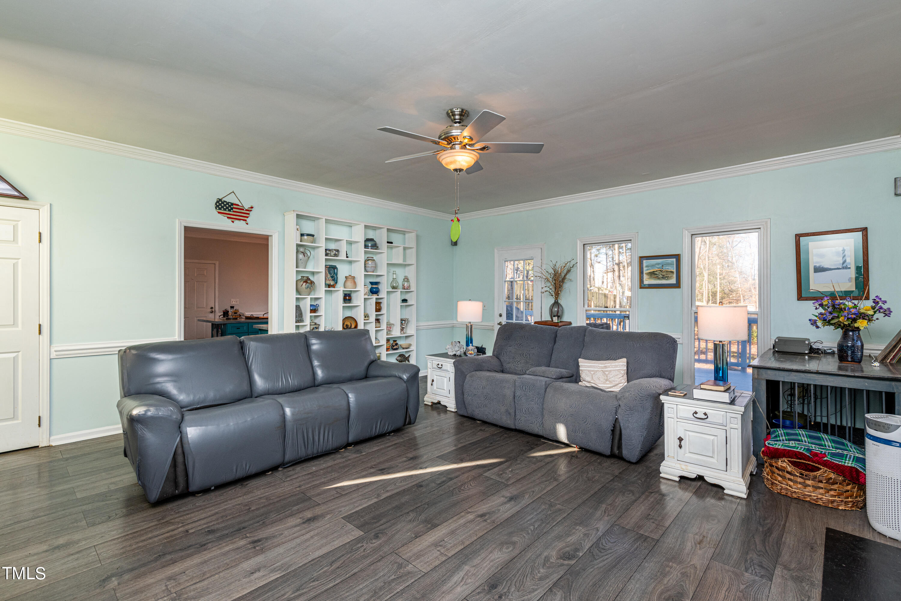 3105 Twatchman Drive Raleigh, NC 27616 - Photo 14 of 38 a living room with furniture and a wooden floor
