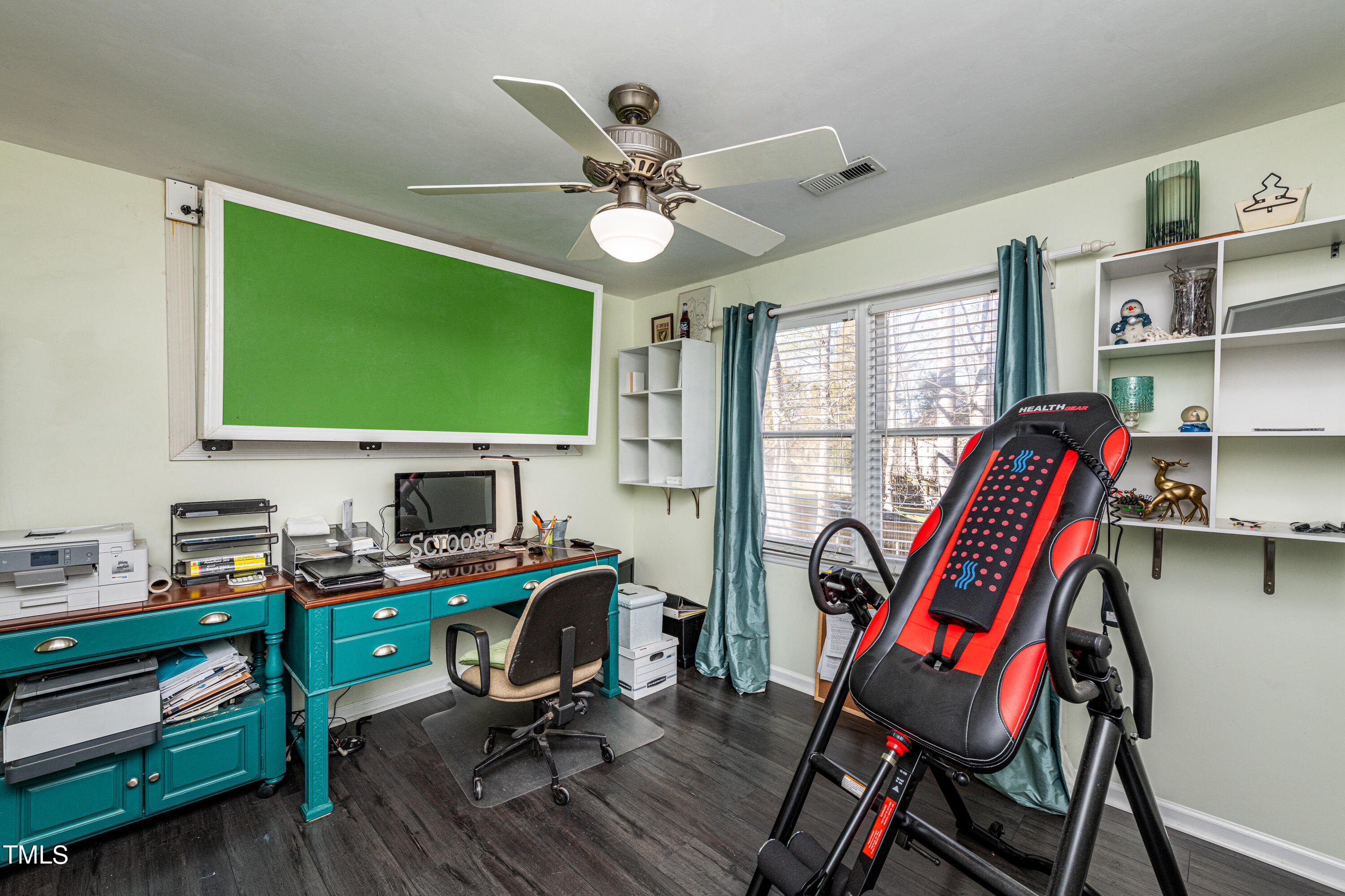 3105 Twatchman Drive Raleigh, NC 27616 - Photo 33 of 38 a view of a workspace with furniture and a window