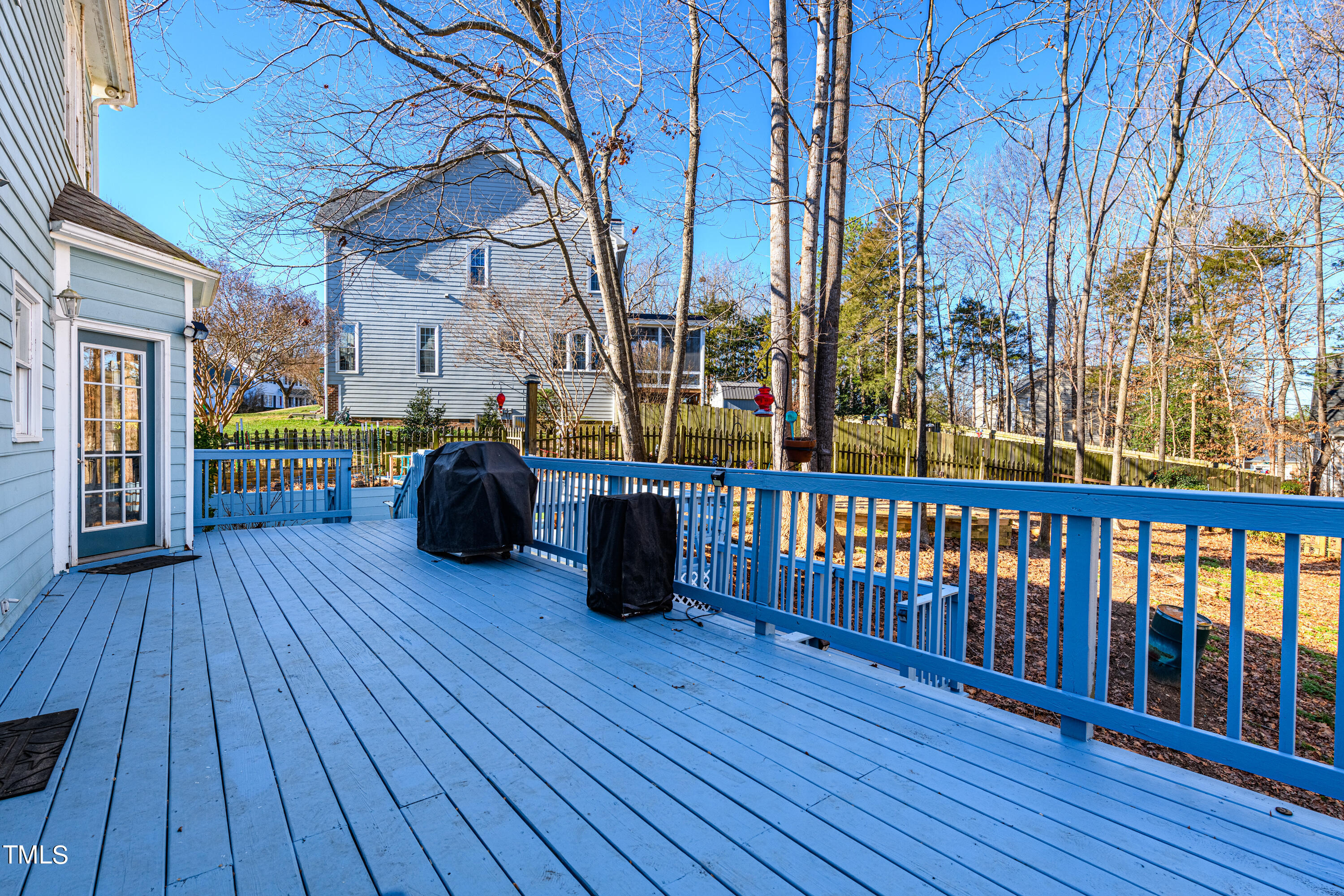 3105 Twatchman Drive Raleigh, NC 27616 - Photo 34 of 38 a view of outdoor space with wooden floor and trees
