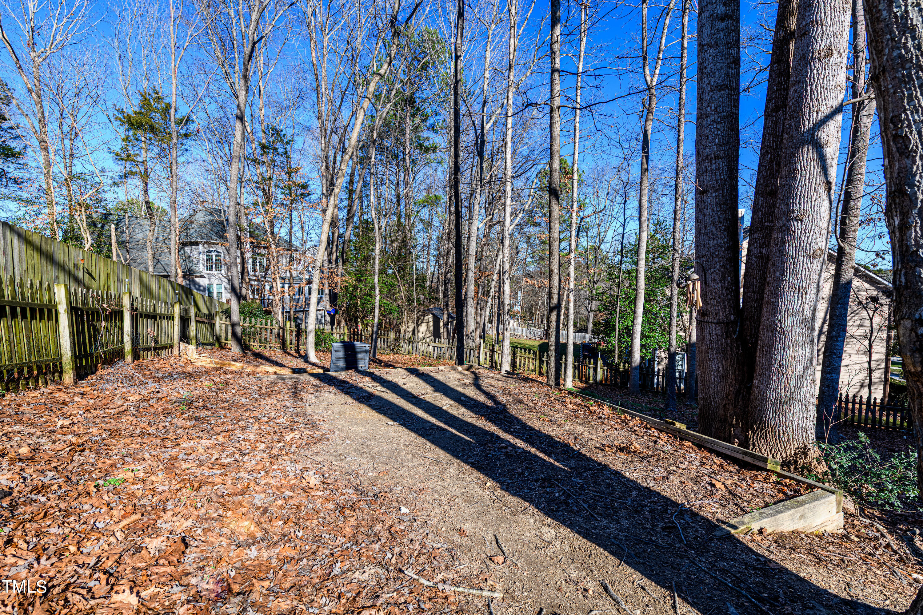3105 Twatchman Drive Raleigh, NC 27616 - Photo 36 of 38 a view of a pathway with a backyard