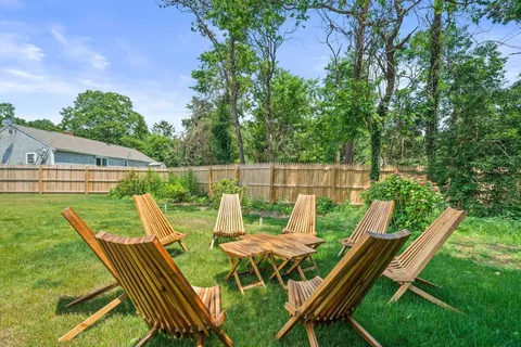 a view of an outdoor sitting area with chairs