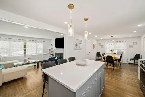 a large living room with furniture