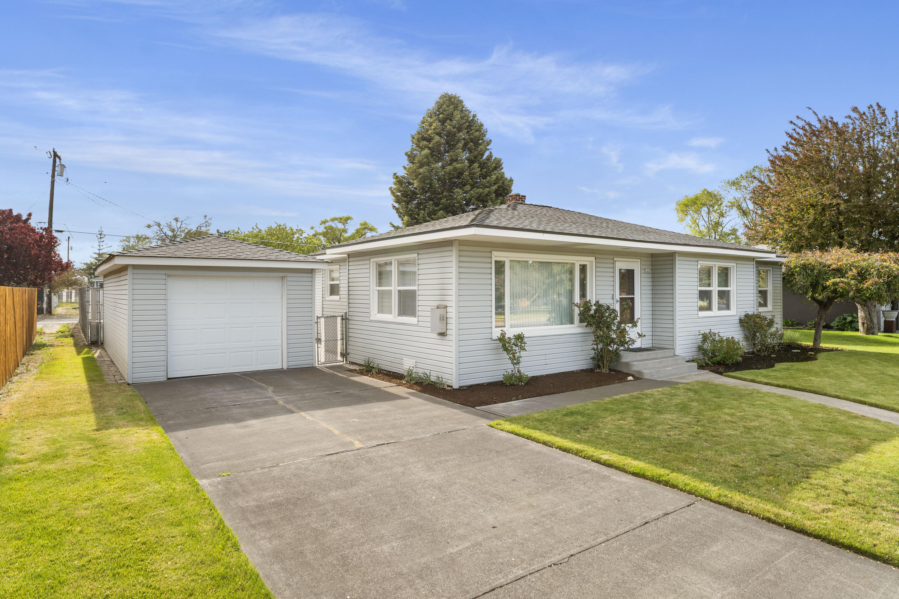 946 Southwest 13th Street Redmond, OR 97756 - Photo 2 of 49 a view of a house with a yard