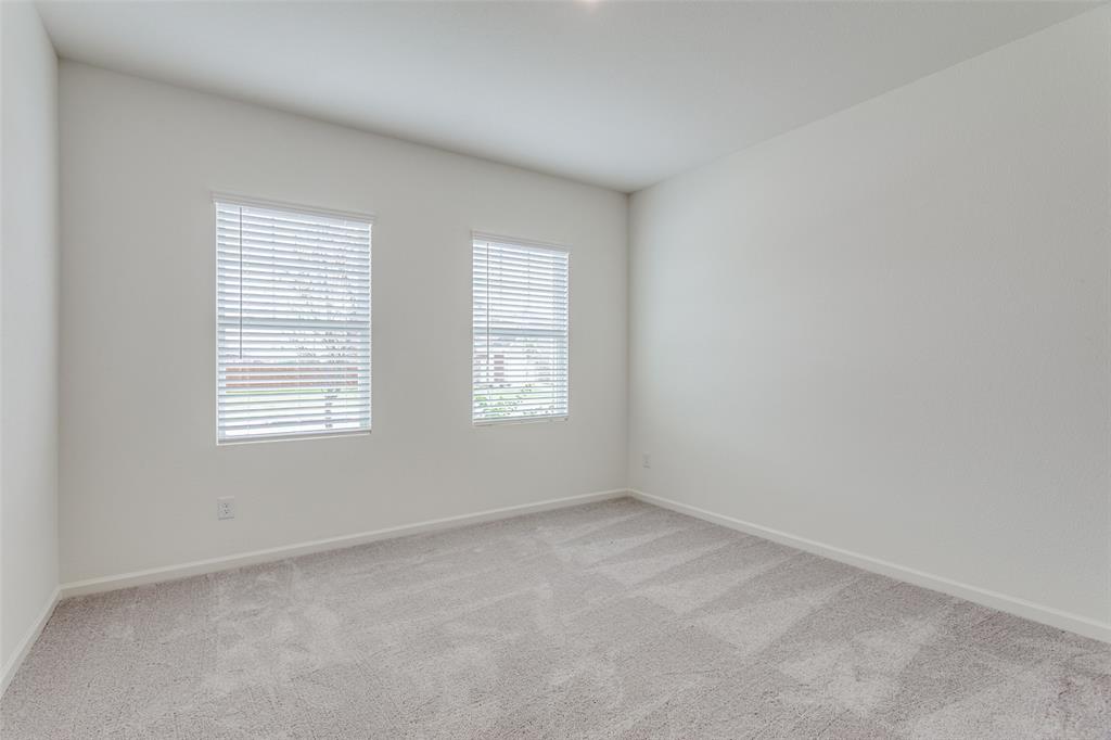 41 Glen Crossings Road Fort Worth, TX 76134 - Photo 8 of 12 an empty room with windows