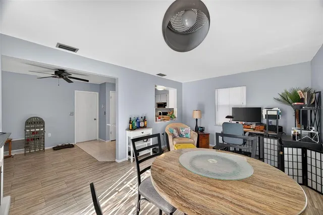 a workspace with furniture and wooden floor