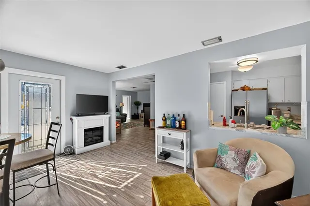 a view of a livingroom with furniture and a fireplace