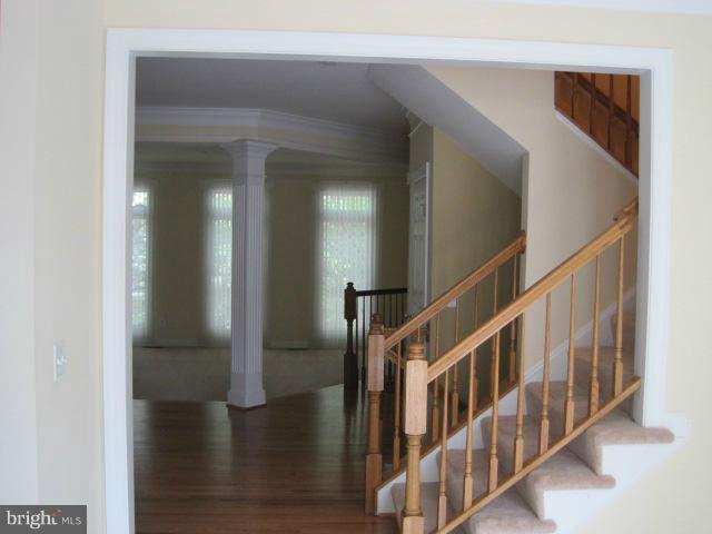 4908 Waple Lane Alexandria, VA 22304 - Photo 11 of 23 a view of an entryway with staircase