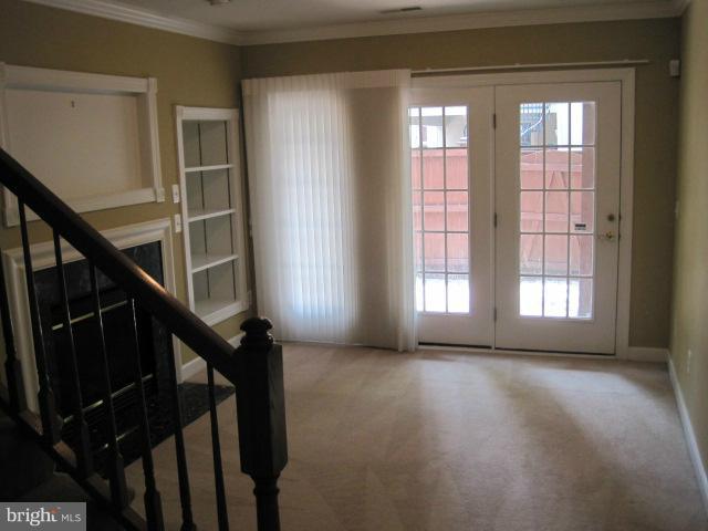 4908 Waple Lane Alexandria, VA 22304 - Photo 19 of 23 a view of entryway and hall with wooden floor