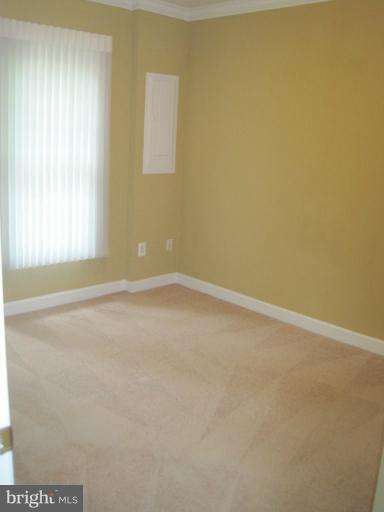 4908 Waple Lane Alexandria, VA 22304 - Photo 21 of 23 an empty room with a empty space and a window
