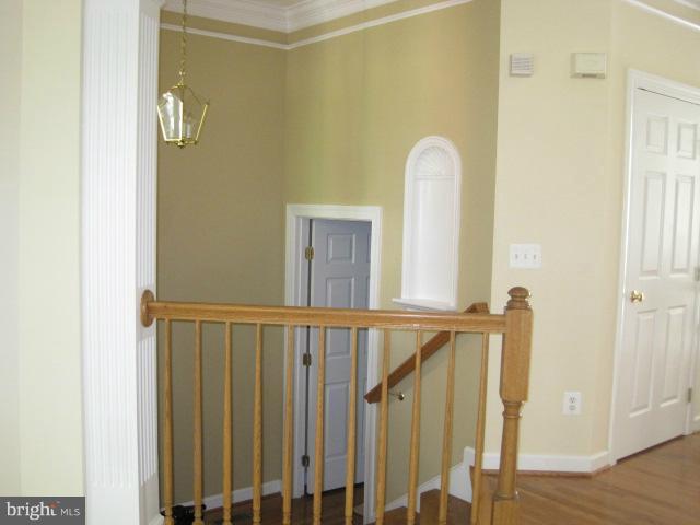 4908 Waple Lane Alexandria, VA 22304 - Photo 5 of 23 a view of a room with wooden floor