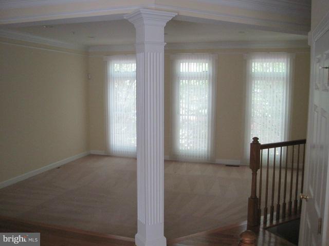 4908 Waple Lane Alexandria, VA 22304 - Photo 6 of 23 a view of a hallway with a window and a bathroom