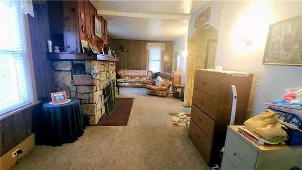 a view of a livingroom with furniture and a couch