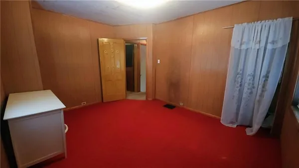 a view of a livingroom with furniture