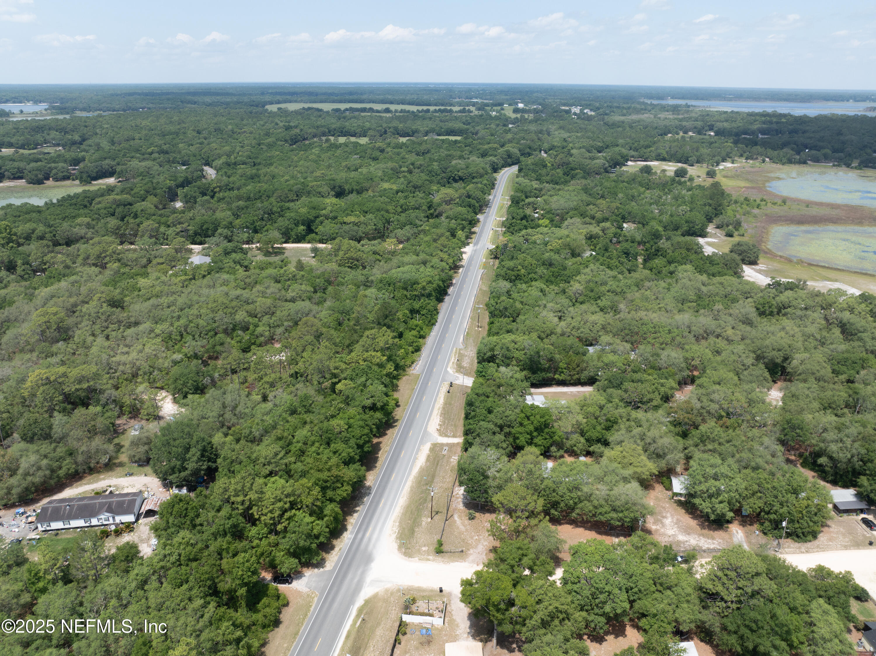 8186 County Line Road Melrose, FL 32666 - Photo 40 of 42 an aerial view of residential house with outdoor space and trees