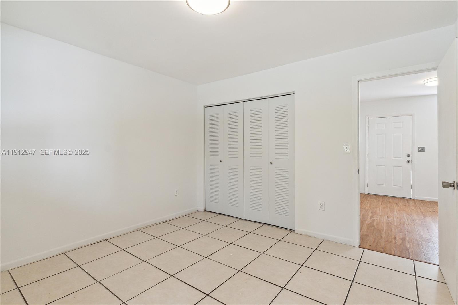 793 Northwest 91st Street, Unit 2 Miami, FL 33150 - Photo 6 of 9 a view of an empty room
