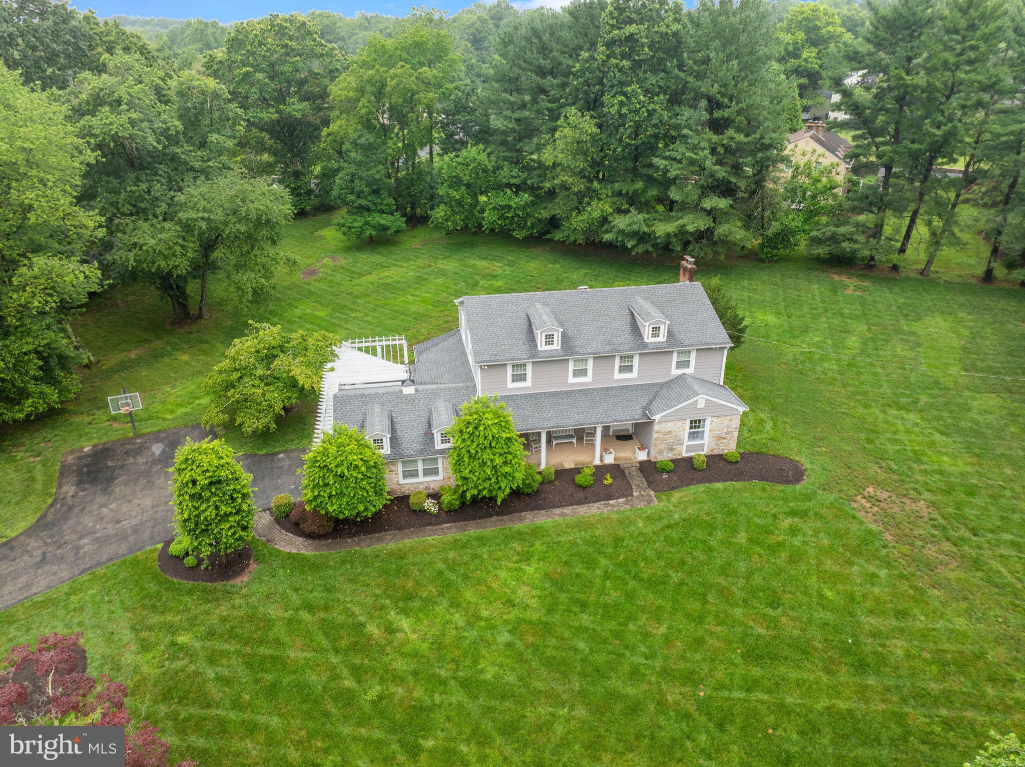 1068 Gypsy Hill Road Ambler, PA 19002 - Photo 54 of 60 an aerial view of a house with a garden