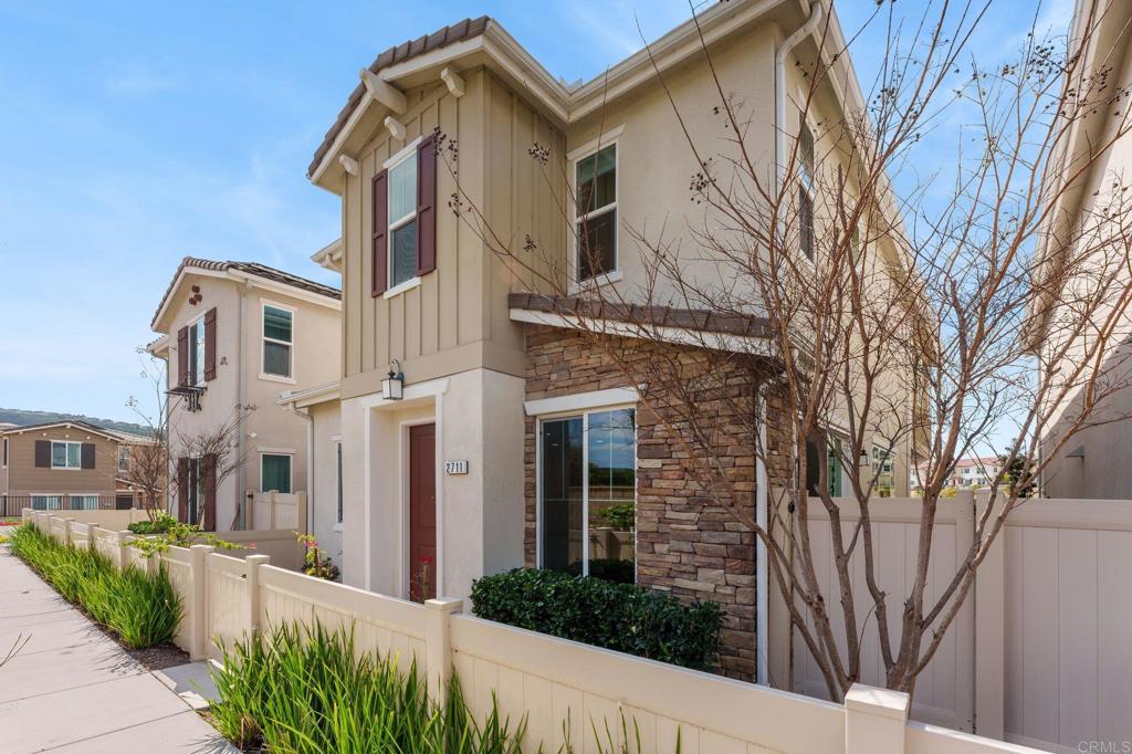 2711 Jujube Street Spring Valley, CA 91977 - Photo 2 of 31 a front view of a house with a garden