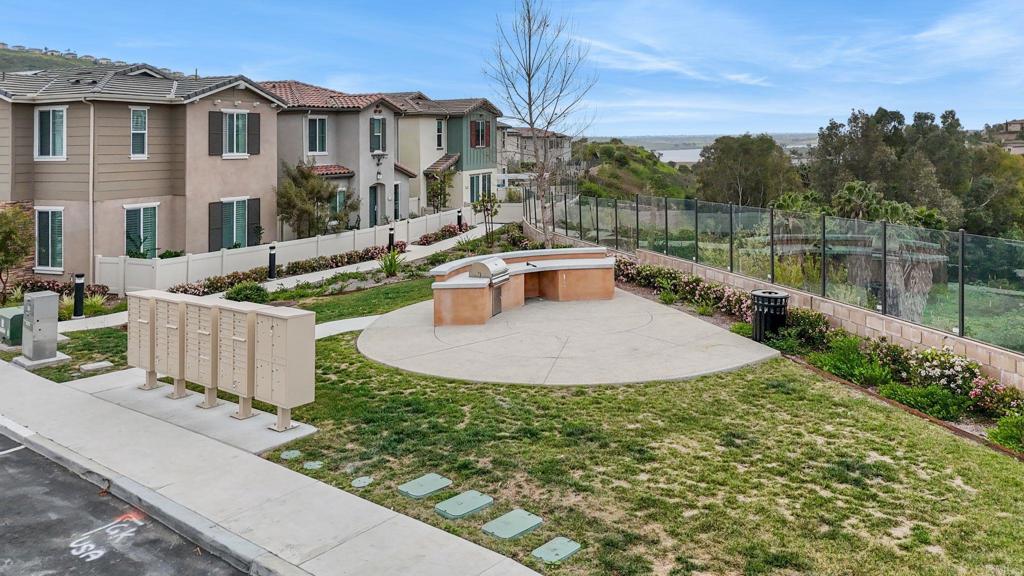 2711 Jujube Street Spring Valley, CA 91977 - Photo 29 of 31 a view of a house with a yard and sitting area