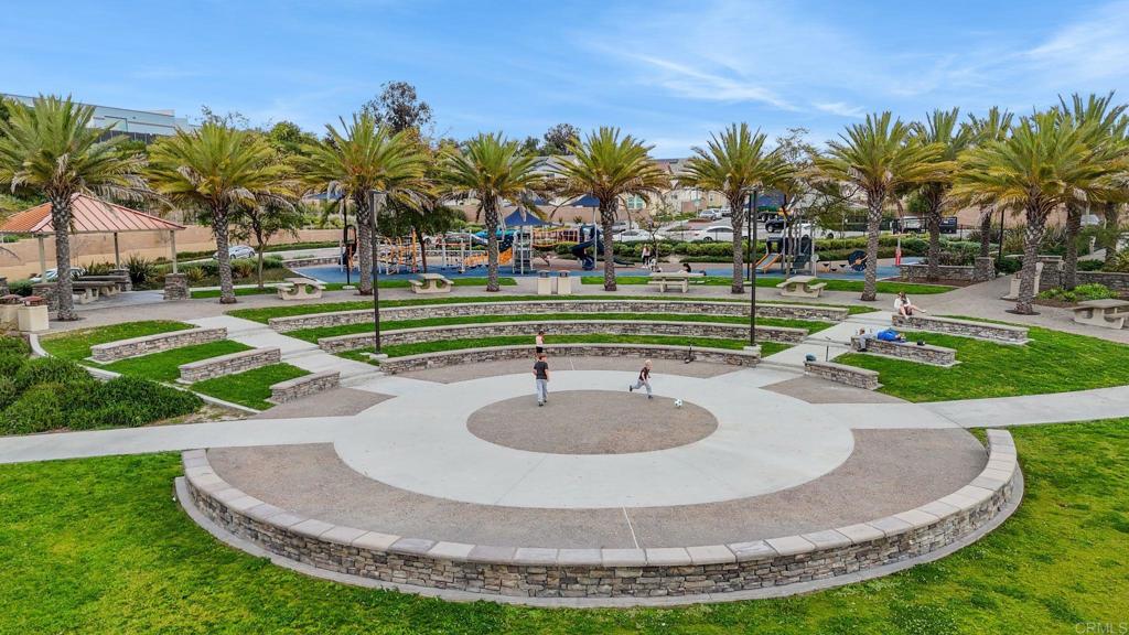2711 Jujube Street Spring Valley, CA 91977 - Photo 31 of 31 a view of a swimming pool with a fountain and plants