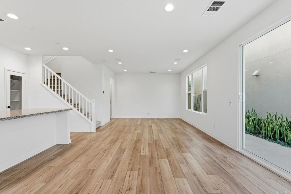 2711 Jujube Street Spring Valley, CA 91977 - Photo 5 of 31 a view of entryway with wooden floor