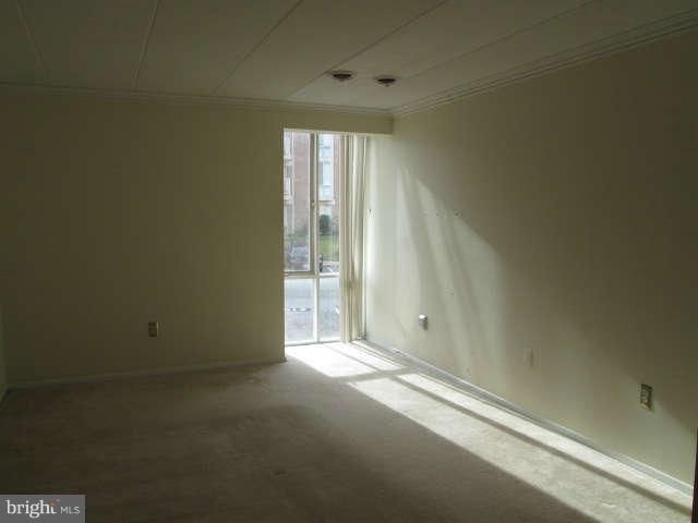 2624 Fort Farnsworth Road, Unit 209 Alexandria, VA 22303 - Photo 14 of 19 an empty room with windows