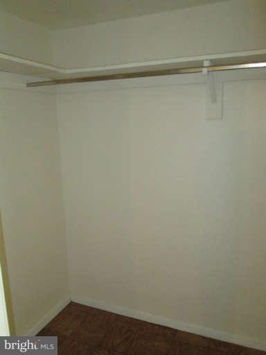 2624 Fort Farnsworth Road, Unit 209 Alexandria, VA 22303 - Photo 16 of 19 a view of a room with racks on the wall