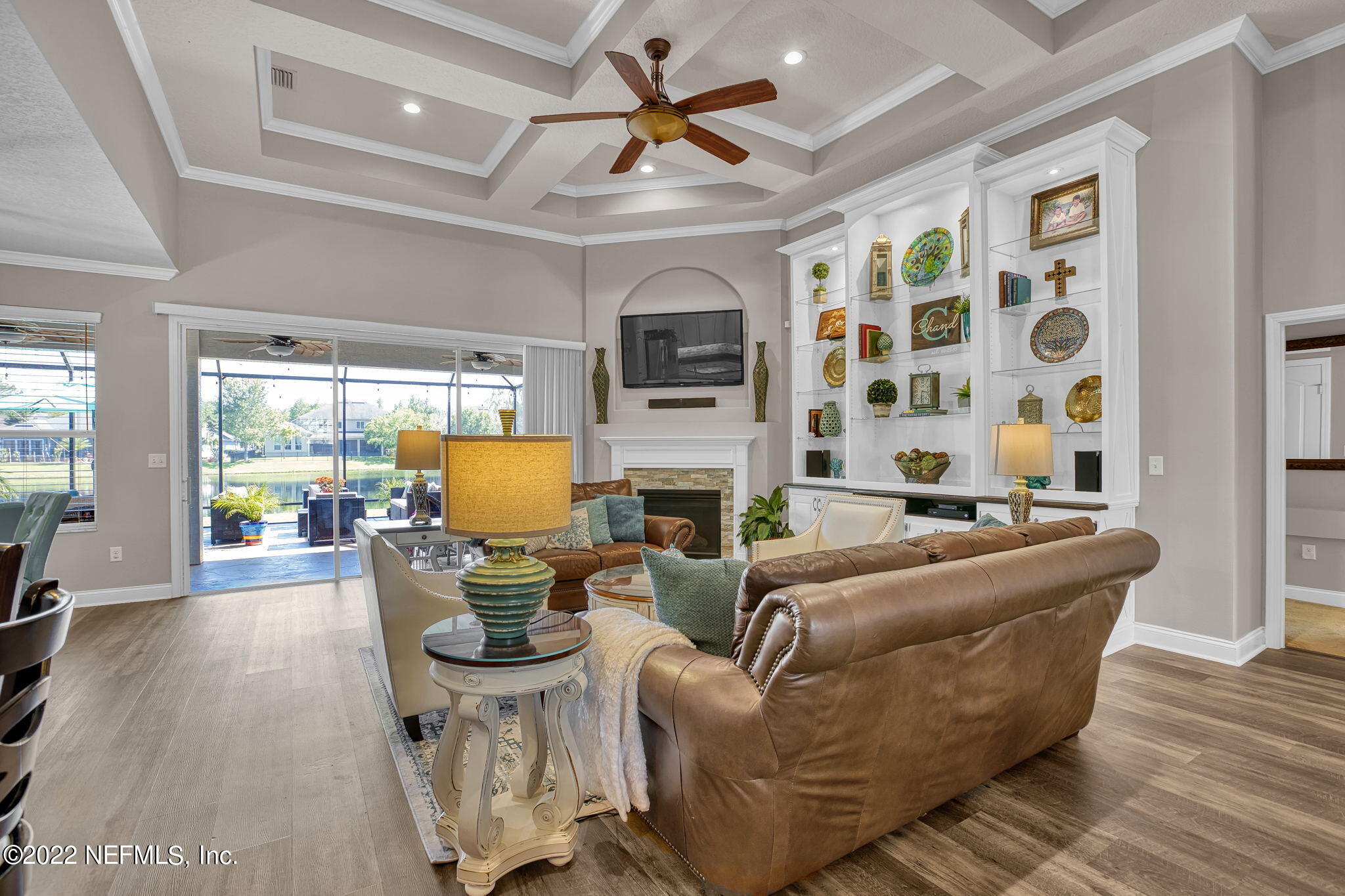 529 Saddlestone Drive St. Johns, FL 32259 - Photo 15 of 54 Crown Molding with Triple Slider Door