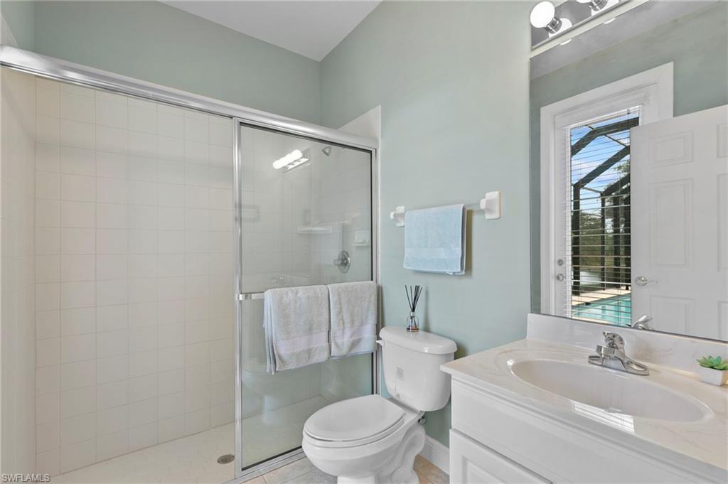 4924 Sedgewood Lane Naples, FL 34112 - Photo 30 of 38 Pool Bathroom
