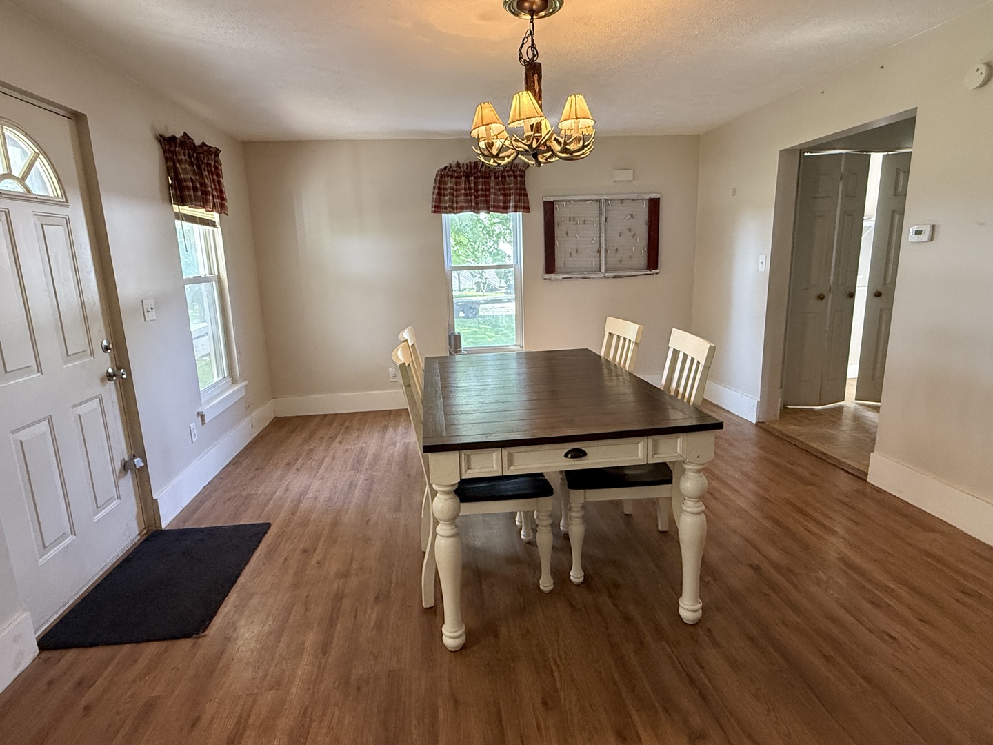 22503 2800th Road North Odell, IL 60460 - Photo 7 of 30 a view of a dining room with furniture and wooden floor
