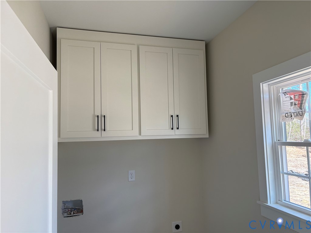15085 Lebanon Road Disputanta, VA 23842 - Photo 3 of 17 a view of cabinets and window