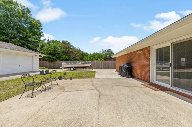 a view of a back yard of the house