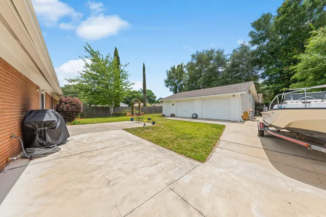 a house view with a garden space