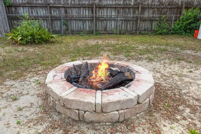 a view of a swimming pool with a backyard