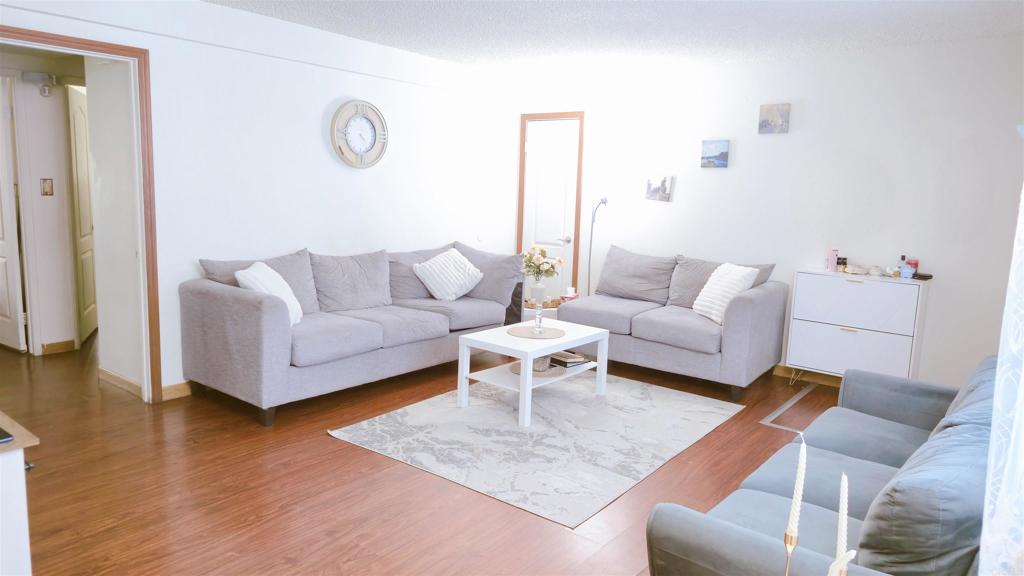 505 East Madison Avenue, Unit 70 El Cajon, CA 92020 - Photo 7 of 13 a living room with furniture and a wooden floor
