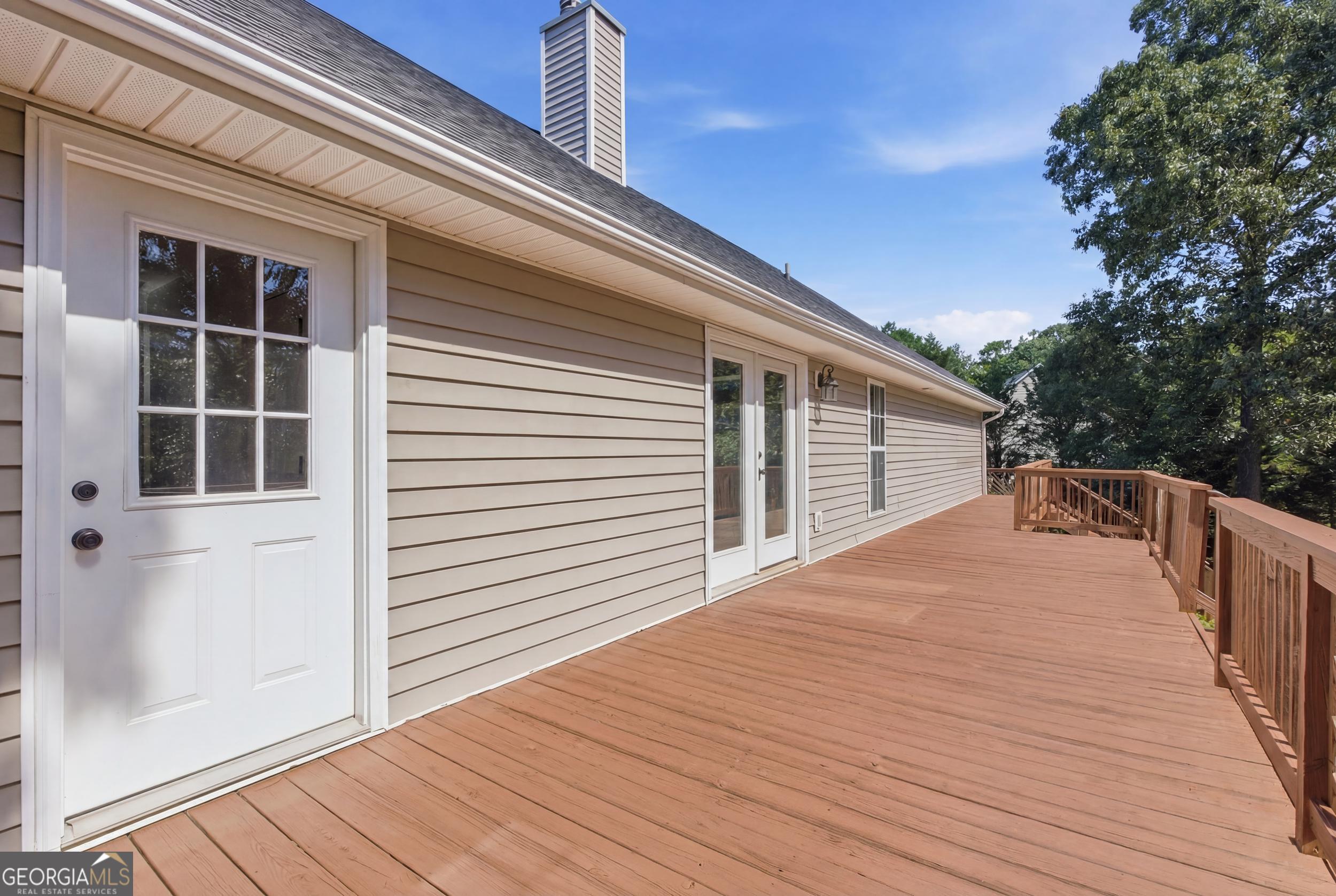 171 Winding Way Hartwell, GA 30643 - Photo 13 of 37 a balcony with wooden floor and fence