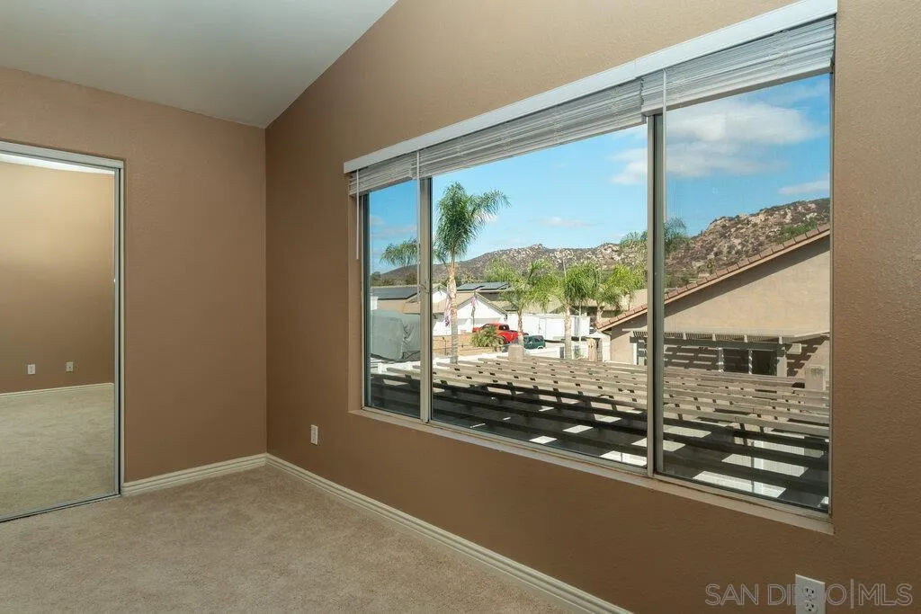 11212 Callio Way Lakeside, CA 92040 - Photo 24 of 50 a view of a glass door with a tree in it