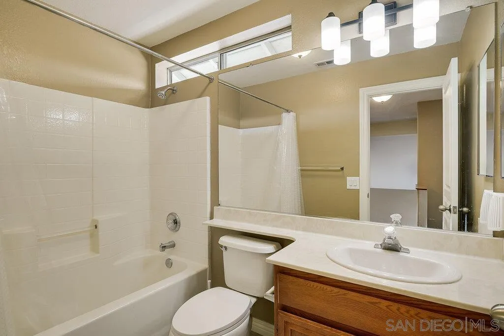 11212 Callio Way Lakeside, CA 92040 - Photo 28 of 50 a bathroom with a sink toilet and shower