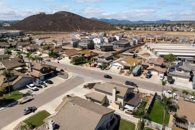 an aerial view of a city with lots of residential buildings