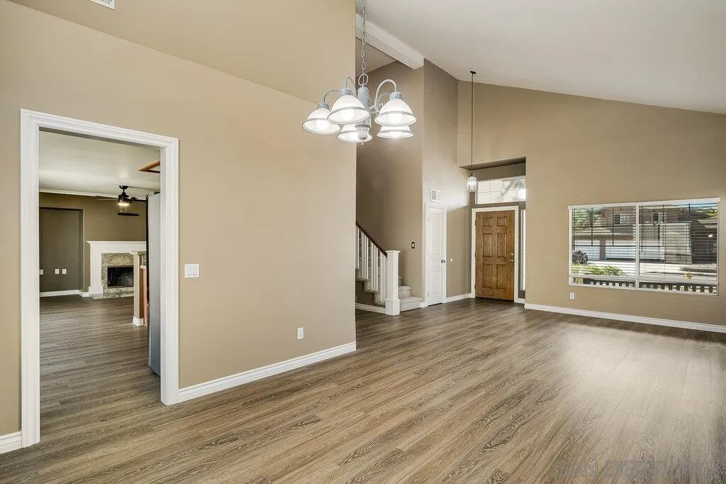 11212 Callio Way Lakeside, CA 92040 - Photo 10 of 50 a view of a livingroom with wooden floor and a chandelier