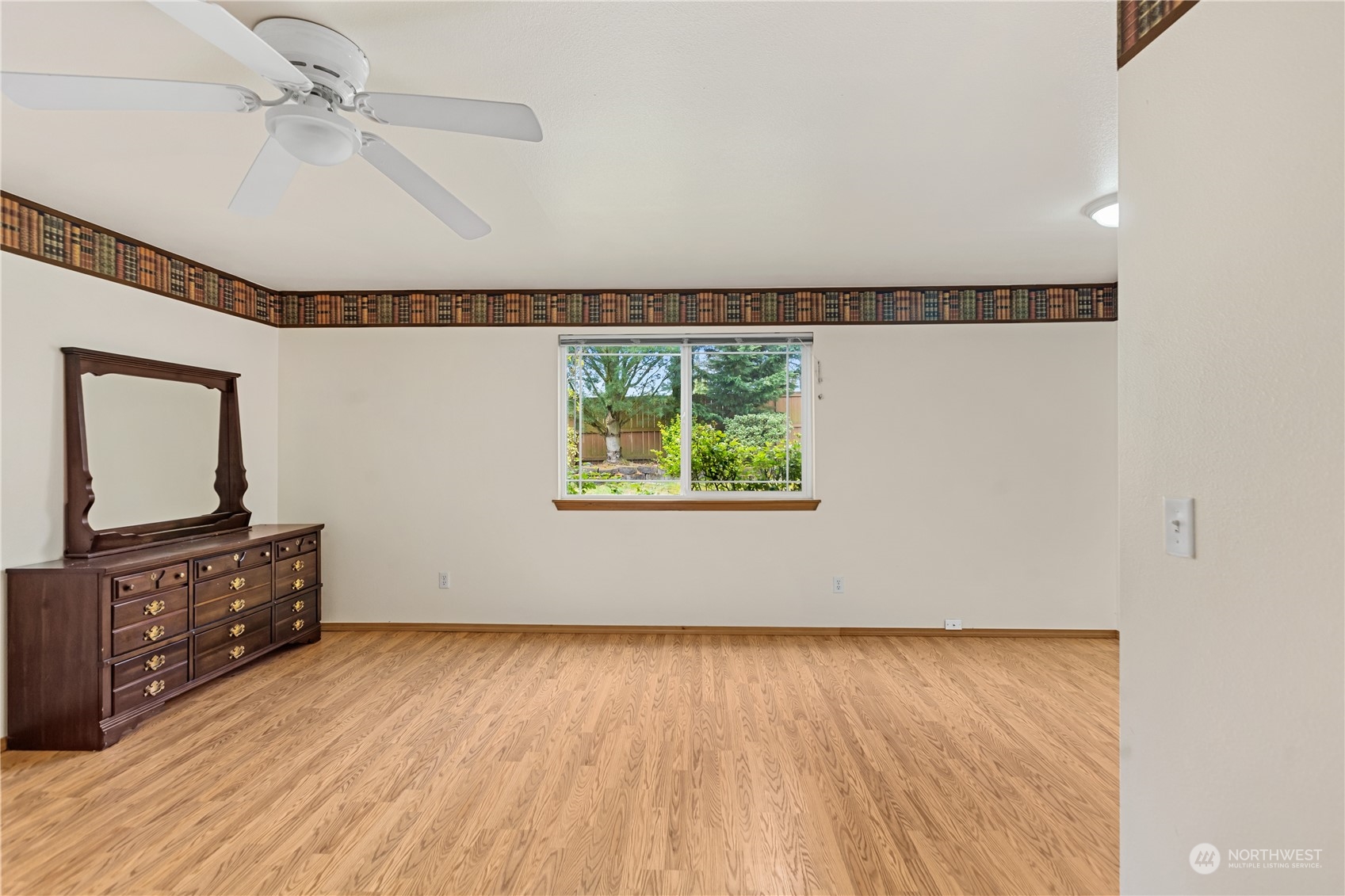 24216 13th Place West Bothell, WA 98021 - Photo 30 of 37 wooden floor in an empty room with a window