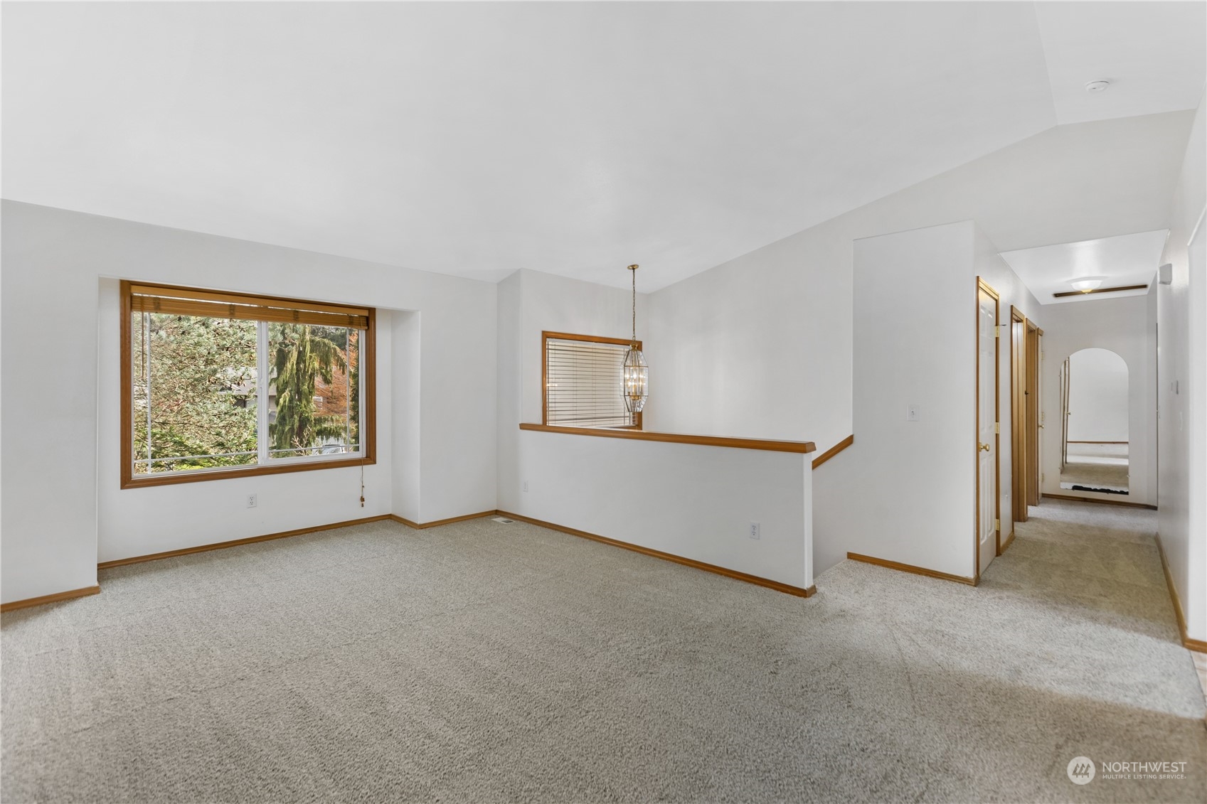 24216 13th Place West Bothell, WA 98021 - Photo 7 of 37 an empty room with windows and closet