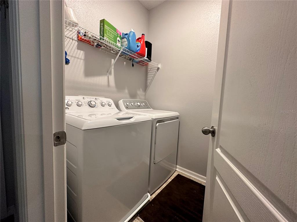 250 Rustic Loop Sanford, FL 32771 - Photo 21 of 33 a utility room with dryer and washer