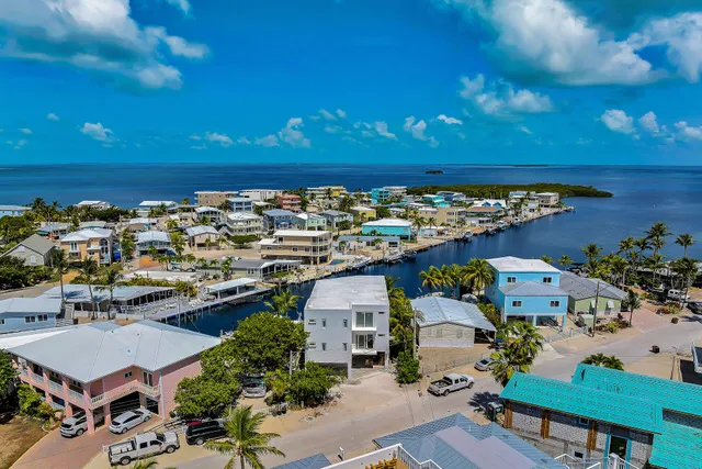 an aerial view of a building with outdoor space