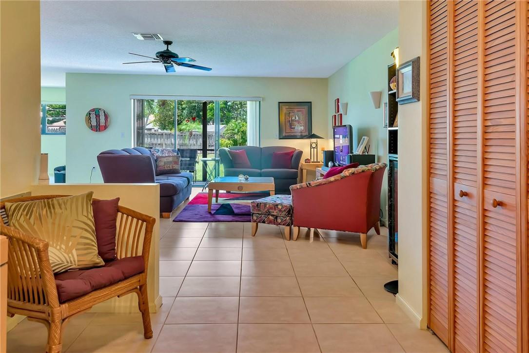 23090 Southwest 56th Avenue Boca Raton, FL 33433 - Photo 3 of 49 a living room with furniture and a window