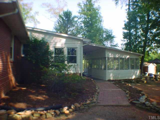 6118 Mebane Oaks Road Mebane, NC 27302 - Photo 2 of 7 Large detached Screen porch.