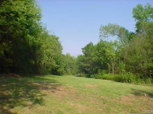 6118 Mebane Oaks Road Mebane, NC 27302 - Photo 5 of 7 Open spaces with rolling land and mature trees.
