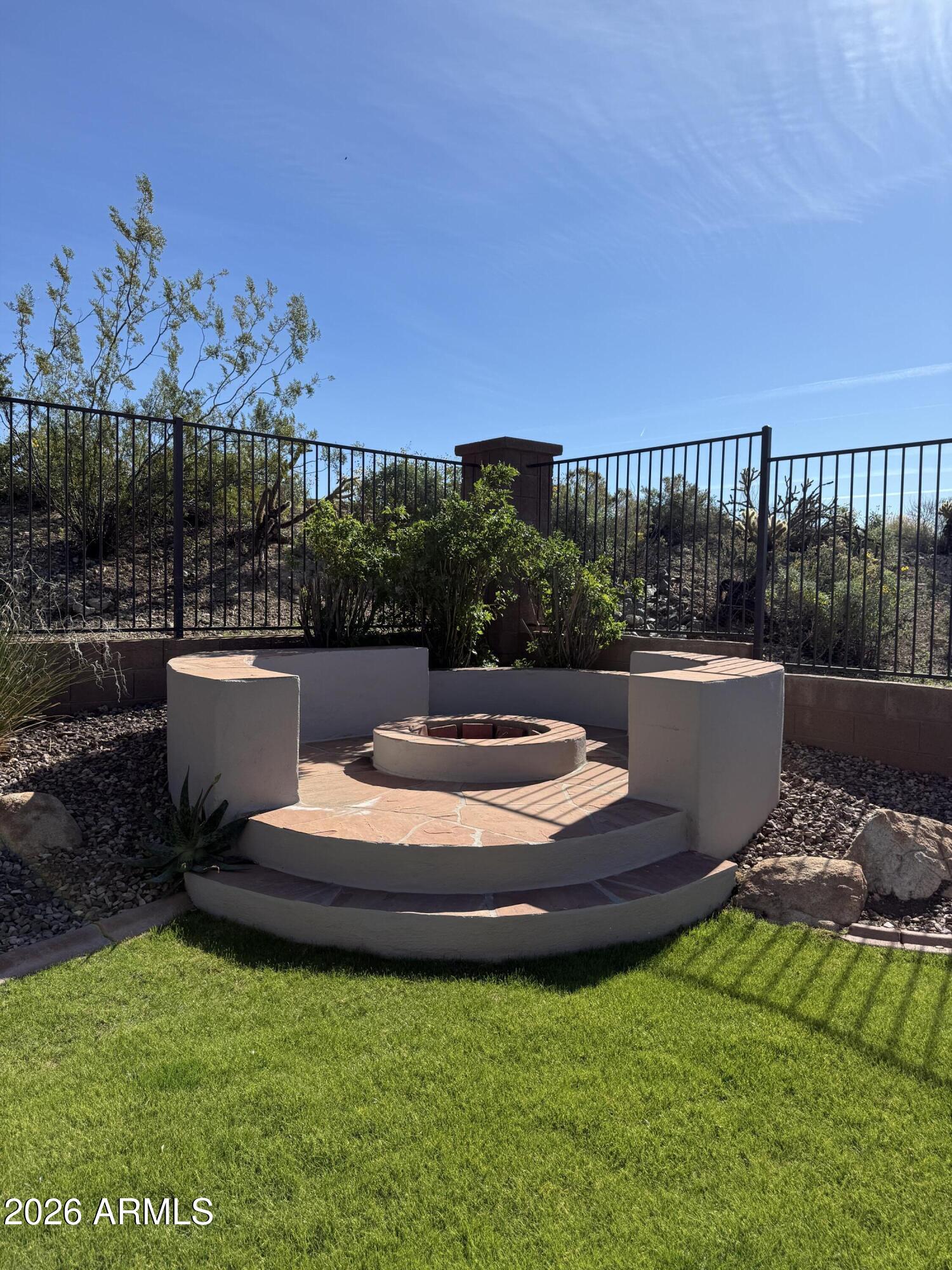 41915 North Crooked Stick Road Anthem, AZ 85086 - Photo 26 of 29 a view of a chairs and table on the terrace