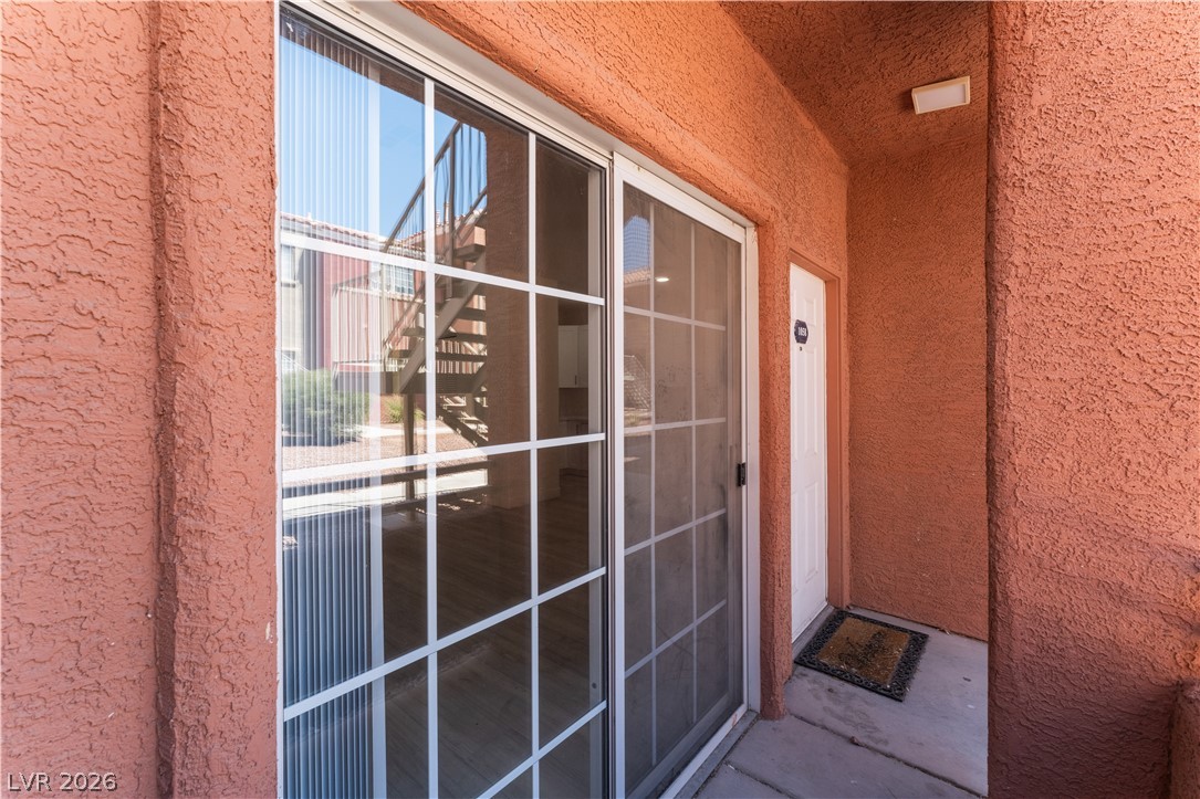 4730 East Craig Road, Unit 1058 Las Vegas, NV 89115 - Photo 4 of 30 A private outdoor patio space with convenient direct entry to the home.